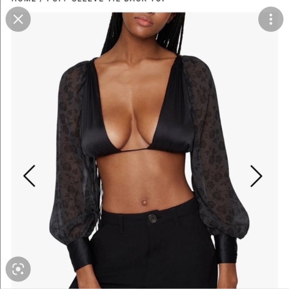 We wore what puff sleeve black tie top in XS